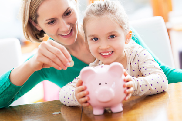 Children with piggy bank